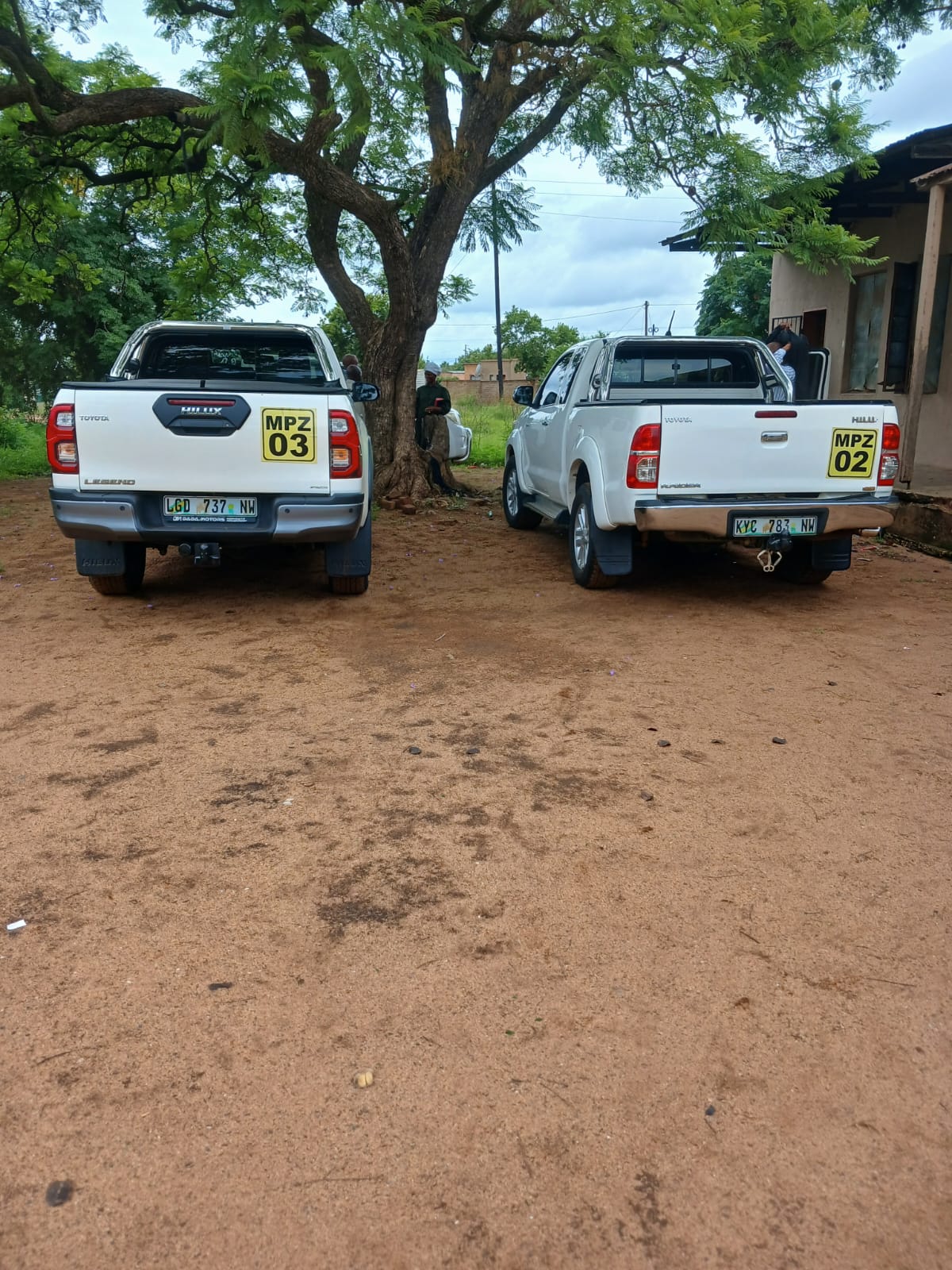 Mpozitho company vehicles marked MPZ 03 and MPZ 02 on site